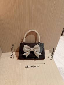 1 chiếc túi xách trang trí nơ đính đá lấp lánh sang trọng, thích hợp cho các bữa tiệc, dạ hội, sự kiện trang trọng, đám cưới. Hoàn hảo làm quà tặng Ngày Valentine cho phái nữ, phối cùng váy dạ hội, váy đính sequin và váy thanh lịch. - màu đen - Xem 5