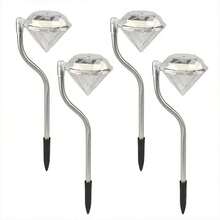 4 个弧形水晶 LED 太阳能草坪灯，适合美丽的户外小路和草坪。
