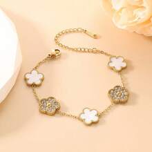 1件优雅闪亮四叶草女士手链：18K镀金高品质钛钢四叶草手镯，专为女性设计，饰有优雅花卉纹理的时尚不锈钢饰品 - 金黃色 - 查看 2