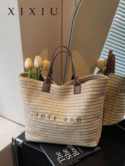 新款时尚大容量字母装饰编织草编手提包，多功能通勤休闲度假编织草编手提包，适合通勤、购物、海滩度假等场合。