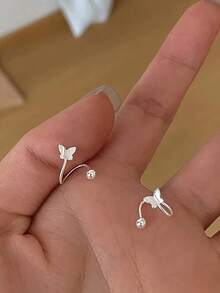 1件S925纯银蝴蝶螺旋肚脐环，时尚甜美，适合女性日常佩戴、约会、派对等场合。 - 單隻肚臍釘 - 查看 2