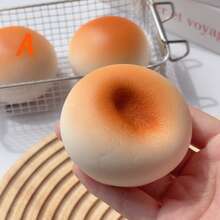 这款面包造型的玩具具有缓慢回弹的特性，柔软粘稠的质地带来非常放松的体验。按压时，它会轻柔地回弹，缓解压力。这款玩具可以帮助缓解压力，释放情绪。它采用逼真的面包和蛋糕造型设计。 - 彩色 - 查看 4