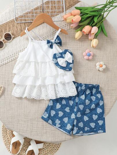 2件套女婴休闲时尚可爱3D蝴蝶结荷叶边镂空装饰背心和爱心印花仿牛仔短裤，配斜挎包，春夏款