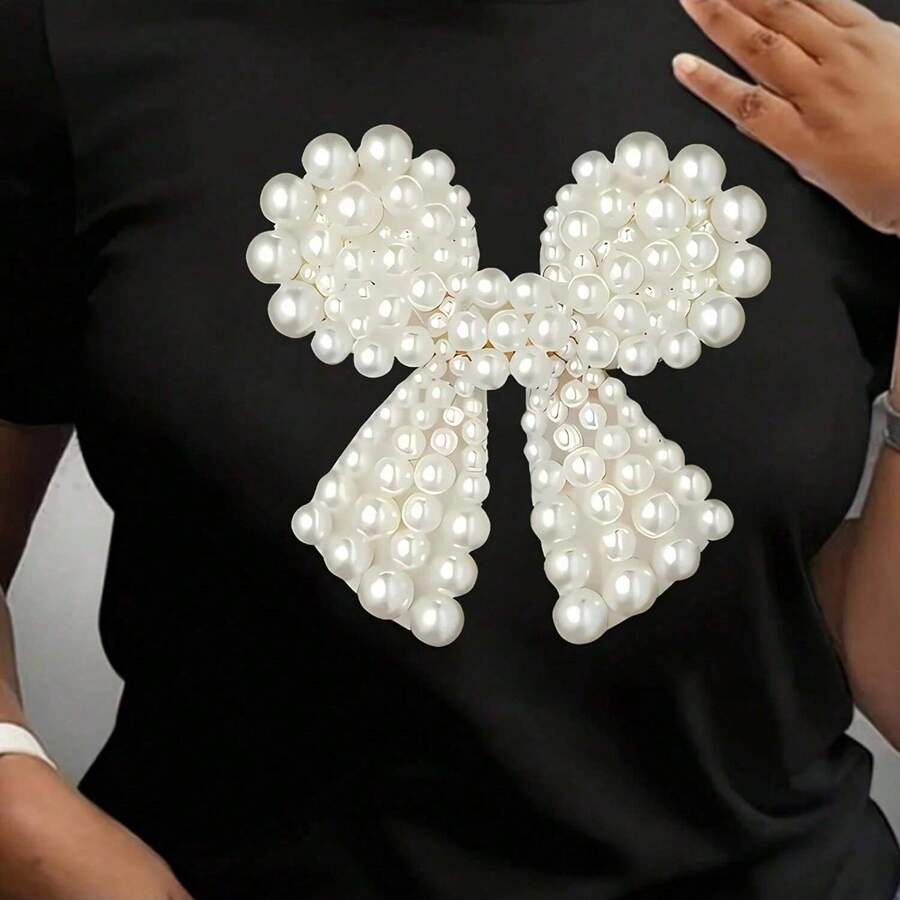 Ladies Black Short Sleeved T-Shirt With Elegant Pearl Bow Design - Round Neck Casual Summer Top - Black - View 1