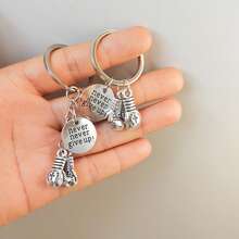 1 pieza/2 piezas/5 piezas Llavero metálico con guante de boxeo 3D realista, llavero inspiracional "Nunca te rindas" con espíritu deportivo, recuerdo de club deportivo, regalo para amigos y familiares atletas de boxeo - Plateado - Ver 7