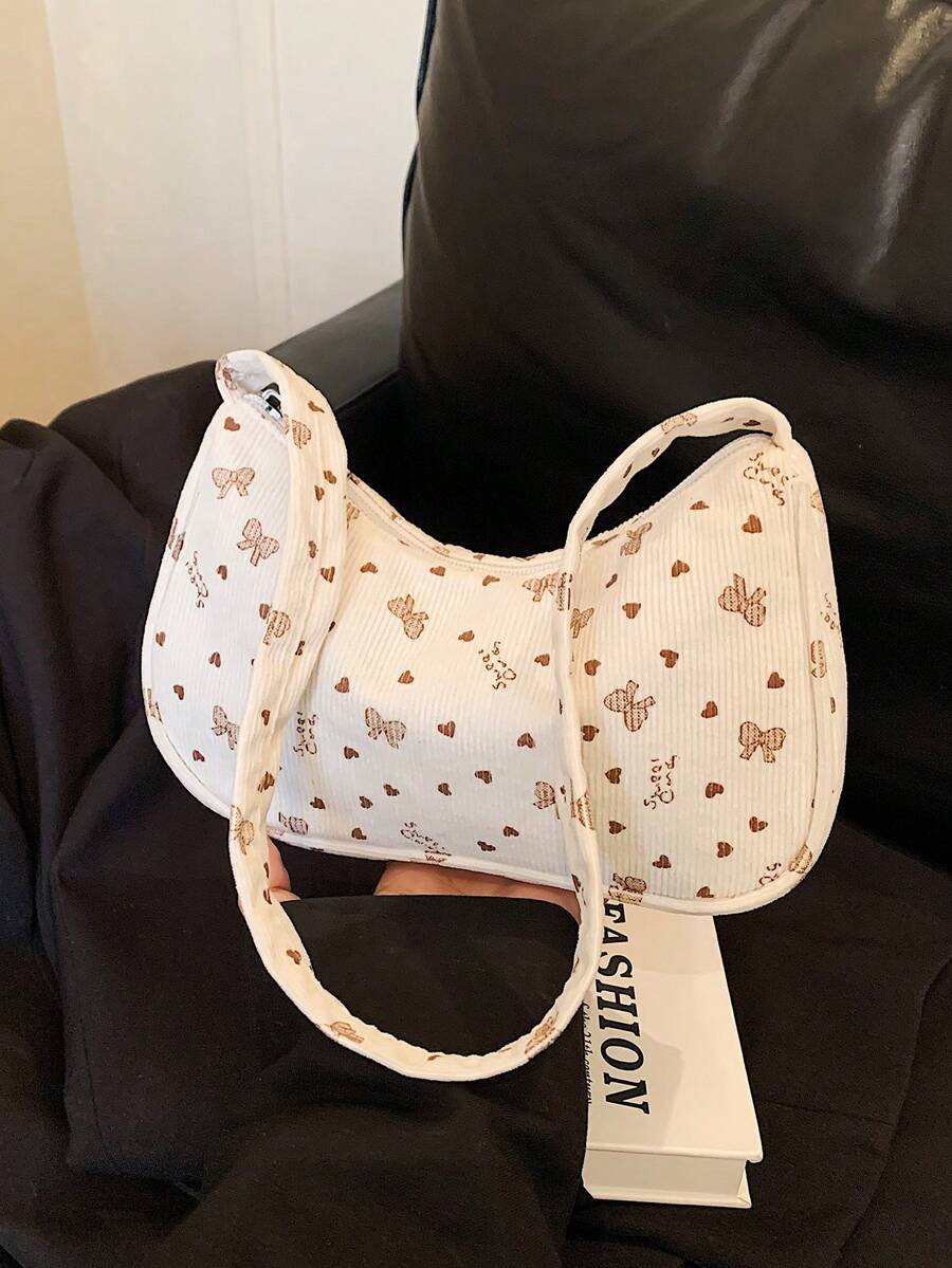 1个纯色灯芯绒拉链单肩包，是女士秋季穿搭的完美配饰，也是情人节的理想之选。