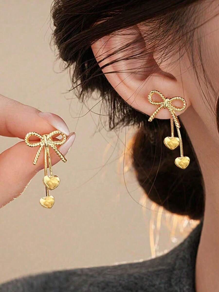 زوج من أقراط الأذن الفاخرة الفريدة ذات الفيونكة الذهبية والشرابة على شكل قلب، مناسبة للنساء، عيد الحب واللبس اليومي - الذهبي - مشاهدة 1