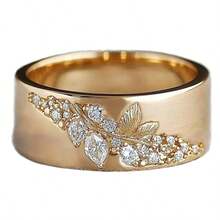 1枚优雅奢华的自然风锆石镶嵌树枝花朵设计戒指，适合女性日常佩戴和参加派对。