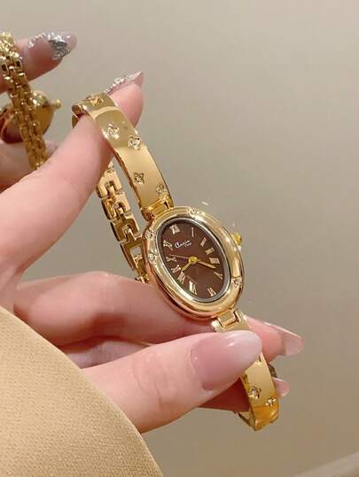 1 件女士椭圆形银黑色表盘金色石英休闲手表，适合日常佩戴