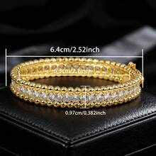 1 chiếc vòng tay mạ vàng 18K, thích hợp cho các sự kiện trang trọng, dạ hội và làm quà tặng cho người thân nữ lớn tuổi, sang trọng và thanh lịch, phù hợp cho các dịp lễ hội. - Vàng - Xem 2