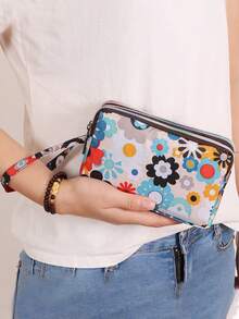 1个时尚印花大容量女士手拿包，带3层拉链隔层和可拆卸腕带 - 耐用印花尼龙材质，适合旅行、日常使用，可装手机、化妆刷、口红、美容工具、化妆品旅行包、拉链零钱包、多功能卡包，女士日常手提包，满足您的外出和日常需求。 - 彩色 - 查看 2
