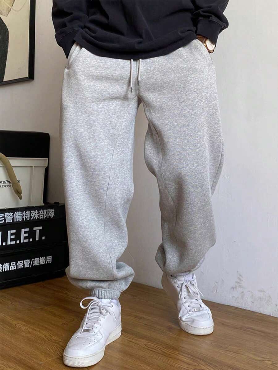 Quần thể thao nam dáng rộng, màu trơn, kiểu quần jogger ống rộng có dây rút, phù hợp cho mua sắm hàng ngày, mặc thường ngày, tập luyện, đi chơi, đi học, lựa chọn lý tưởng cho trang phục mùa xuân/thu của nam giới, món quà hoàn hảo dành cho phái mạnh. - Xám - Xem 1