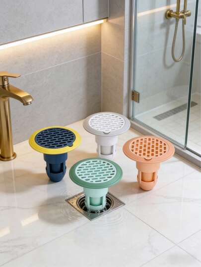 这款通用型地漏除臭器采用ABS材质，圆形密封盖设计，带有精确的导向孔和紧密的密封圈。它具有除臭和防虫功能。