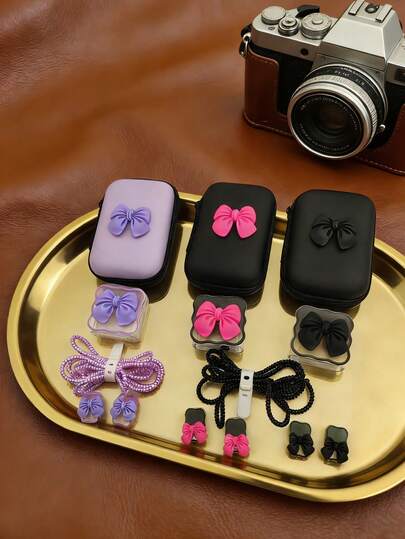 Set de 6 piezas de accesorios para cables de carga con moños en colores púrpura, rosa y negro, que incluye estuche rígido a prueba de golpes de EVA, organizador de cables y funda protectora para cables de carga y datos diarios