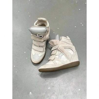 The New 2026 Wedge Sneakers Combine Beige Suede And Leather, With A Retro High-Top Design And A Practical Closure. A Hidden 5cm Wedge Heel Provides Added Height And Comfort, Ideal For Everyday Wear And Casual Occasions.
