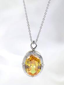 1件S925银黄钻心形吊坠项链，中央镶嵌一颗大椭圆形黄钻，心形吊坠设计，纹理饰边，点缀小钻，简约优雅的设计，适合日常佩戴和轻度场合。 - 銀色 - 查看 4