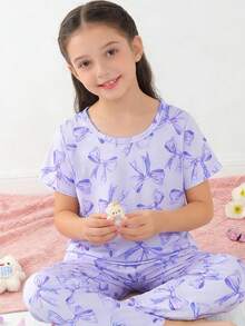 2 pezzi Set pigiama per ragazze pre-adolescenti, motivo a fiocco carino, top a maniche corte con scollo tondo viola e pantaloni, in tessuto a maglia ignifugo, può essere indossato come abbigliamento da relax, adatto per tutte le stagioni, primavera/estate per ragazze - Lilla Viola - Visualizzare 10
