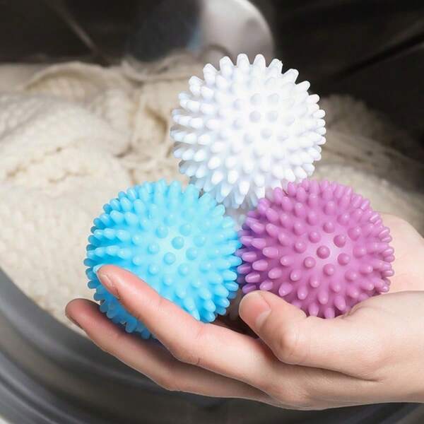 2个/4个/8个装可重复使用的神奇洗衣球，中空设计，有效摩擦衣物去除污渍，柔软厚实，经久耐用，白色/蓝色/紫色可选，增强水涡流功能，清洁更彻底，呵护衣物。