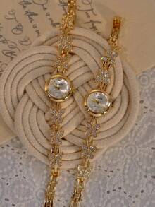 Nouvelle montre pour femme en forme de papillon, plaquée or et de style français, est exquise, élégante et raffinée, avec un petit côté rétro haut de gamme. Fonctionnant à quartz, elle est idéale au quotidien, pour les fêtes, les occasions spéciales ou comme cadeau d'anniversaire ou de Noël. - Doré - Voir 4