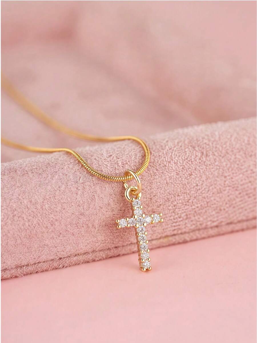1件青少年风格迷你十字架镀金立方氧化锆吊坠项链，采用钛钢材质，搭配镀金蛇骨链和不锈钢，金色饰品，长度可调节。适合圣诞节搭配佩戴，也是节日礼物佳选。附赠精美礼盒。 - 45n - 查看 1