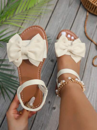 2026 Spring/Summer New Women's Flat Sandals, Plus Size, Beige Bow Design, Beach & Resort Style, Casual & Fashionable, Versatile, Non-Slip Sole, Open Toe, Perfect For Summer, Ideal For Beach Vacation, Slip-On Design, Suitable For Daily Wear, Party & Outdoor Activities, Ideal Valentine's Day Gift For Fashionable Women