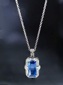 1件S925银蓝色钻石长方形吊坠项链，以一颗硕大的长方形蓝色钻石为中心，周围环绕着几何图案的密镶钻石，简约而精致的设计，适合日常佩戴和轻度商务场合。 - 銀色 - 查看 3
