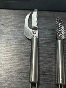 1个不锈钢鱼鳞去除器，锋利刀片快速去除鱼鳞，刷子设计可清洁残留杂质，轻松完成鱼鳞去除过程。 - 魚鱗去除工具 - 查看 10