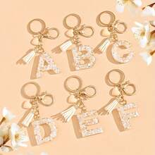 1 móc khóa chữ cái đầu màu be trung tính kèm tua rua hình trái tim dễ thương, phụ kiện túi xách, quà tặng tiệc tùng, thích hợp làm quà tặng cho bạn bè. - Màu be - Xem 1