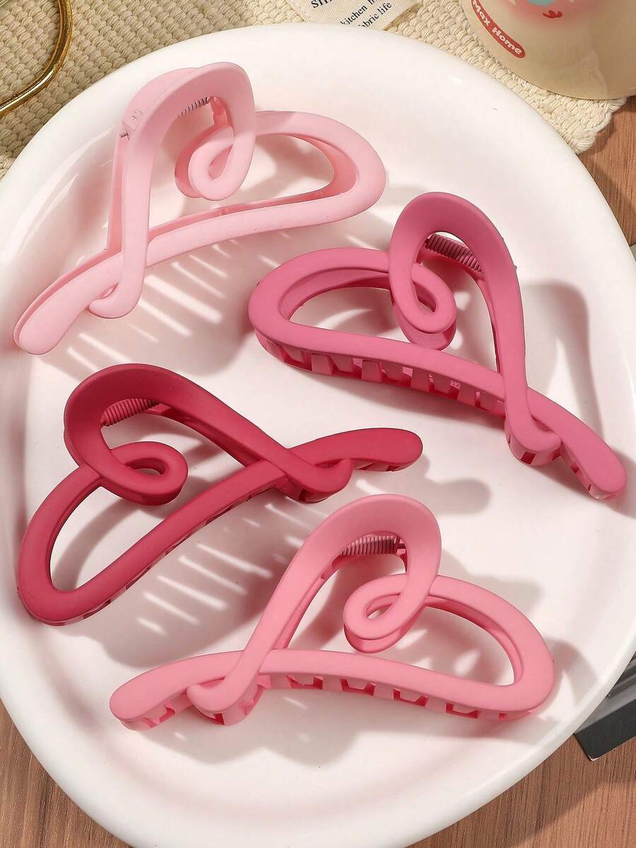 4个ABS哑光镂空心形发夹，优雅甜美粉色，手工绘制，适合秋冬季节，可搭配马尾辫、发髻等休闲及节日发型，时尚发饰，优雅爪夹