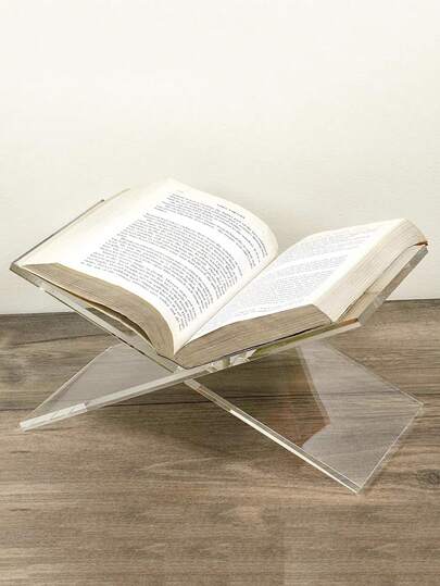 1个X型亚克力透明书架，黑白两色可选，适用于书架、音乐专辑展示架、家居装饰，可用于图书馆、食谱架、专辑架以及各种书籍的展示和收纳，也可作为厨房台面装饰。