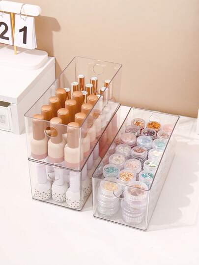 1 hộp đựng bằng nhựa trong suốt dung tích lớn, dùng để đựng sơn móng tay, sơn gel, đá trang trí móng và dụng cụ làm móng, giá đựng sơn móng tay có thể xếp chồng lên nhau, thích hợp sử dụng tại nhà và tiệm nail.
