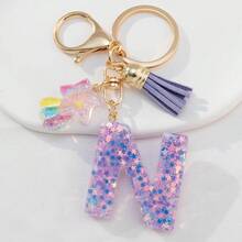 星形英文字母树脂钥匙扣，饰有彩色流星紫色流苏，适用于包包链、手机挂链、钥匙扣，也是送给朋友和母亲的礼物。 - 紫丁香色 - 查看 12