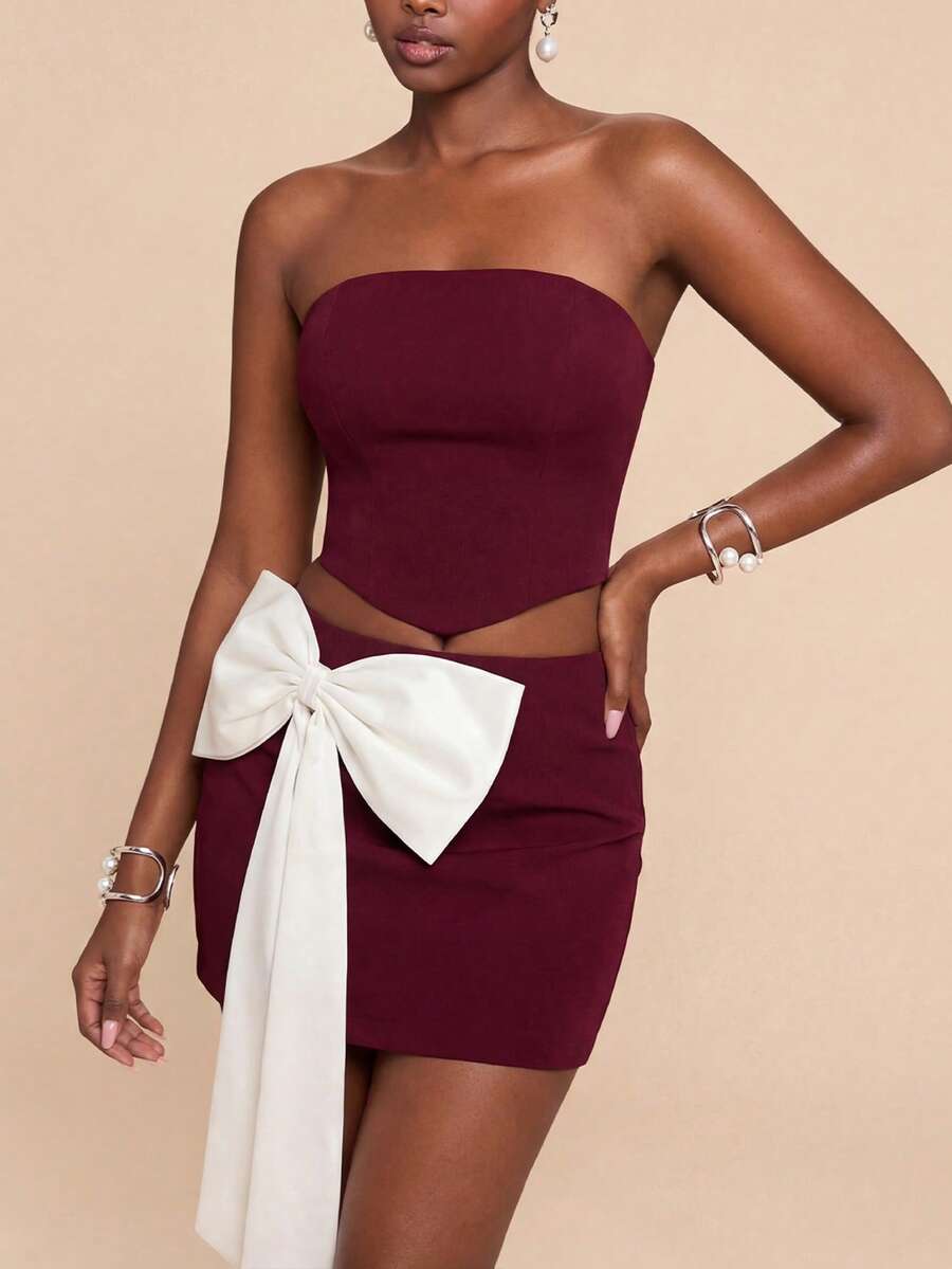 Burgundy Strapless Crop Top & Fitted Mini Skirt Two Pieces Set With Large White Bow Accent & Multiple White Cross-Back Straps – Elegant Sweet Chic Style Ideal For Weekend Brunches, City Strolls, Spring/Summer Dates, Fashion Gatherings,Vacation, Plain Outfits - Burgundy - View 1