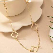 Minimalist Versatile Stainless Steel Hollow Four-Leaf Flower Necklace, Gold Fashion Four-Leaf Flower Pendant Long Sweater Chain - Long Necklace - View 4