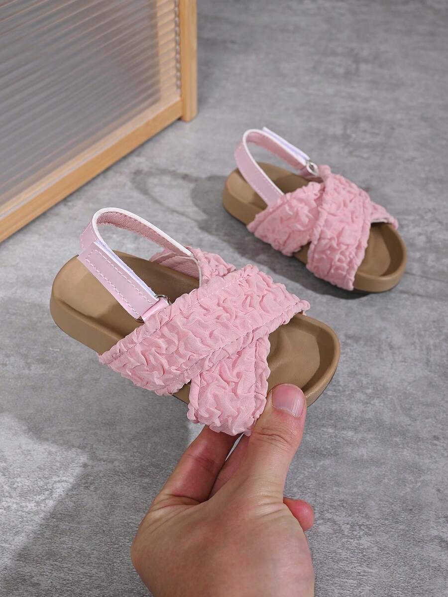 "Girls' Textured Cross-Strap Sandals – Adjustable Ankle Strap, Soft Padded Footbed, Non-Slip Sole, Stylish Casual Summer Kids Footwear" - Pink - View 1