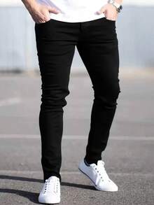 Jeans ajustados de color negro sólido elásticos para adolescentes, pantalones de mezclilla de corte slim para adolescentes - Negro - Ver 1