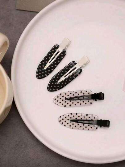 4个时尚可爱黑白波点发夹，亚克力材质，可固定刘海和侧边，适合女性装饰