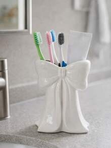 1pc Nordic Bow-Knot Toothbrush Holder, Electric Toothbrush Stand, Cosmetic Storage Rack, Toothbrush Organizer, Home Desktop Decor, Stylish Room Decoration, Home Decor, Space-Saving Storage, For Kitchen, Bathroom, Bedroom - Multicolor - View 2