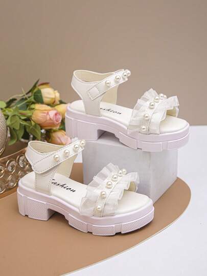 2025款儿童凉鞋，适合3-12岁男孩女孩，四季必备！便捷的魔术贴搭扣，柔软鞋底，无SMPS（可能是指某种鞋底材质或品牌名称，无法翻译），是上学、海滩、演出、红毯等场合的理想之选！