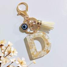 1个米色字母钥匙扣，恶魔之眼钥匙扣，流苏包饰吊坠，派对礼品 - 米色 - 查看 17