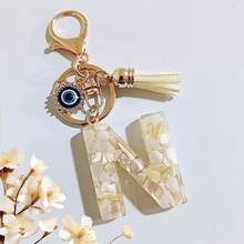 1个米色字母钥匙扣，恶魔之眼钥匙扣，流苏包饰吊坠，派对礼品 - 米色 - 查看 9