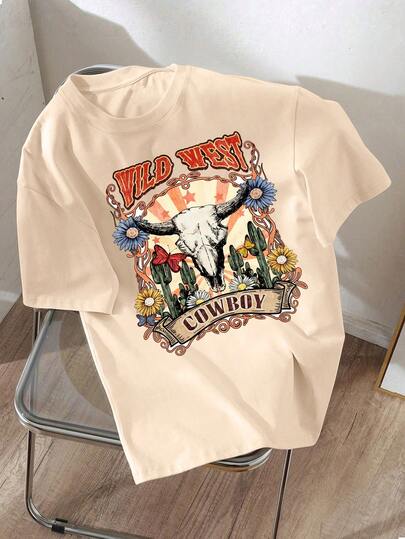 这款短袖T恤专为年轻女性设计，饰有卡通公牛和仙人掌图案，是一款舒适透气的宽松上衣，可作为夏季百搭休闲T恤穿着。