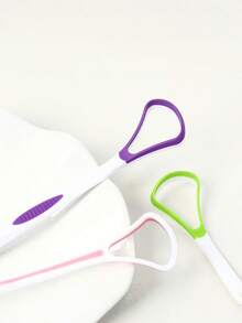 这款 1/4 件装舌苔清洁器旨在有效去除舌头表面的细菌、食物残渣和引起异味的物质。 - 彩色 - 查看 11