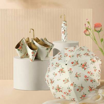 Paraguas plegable portátil de 8 varillas reforzado con acabado en oro rosa