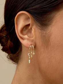 一对时尚奢华不对称流苏立方氧化锆黄铜镀金耳环，适合派对、度假、送礼和日常佩戴