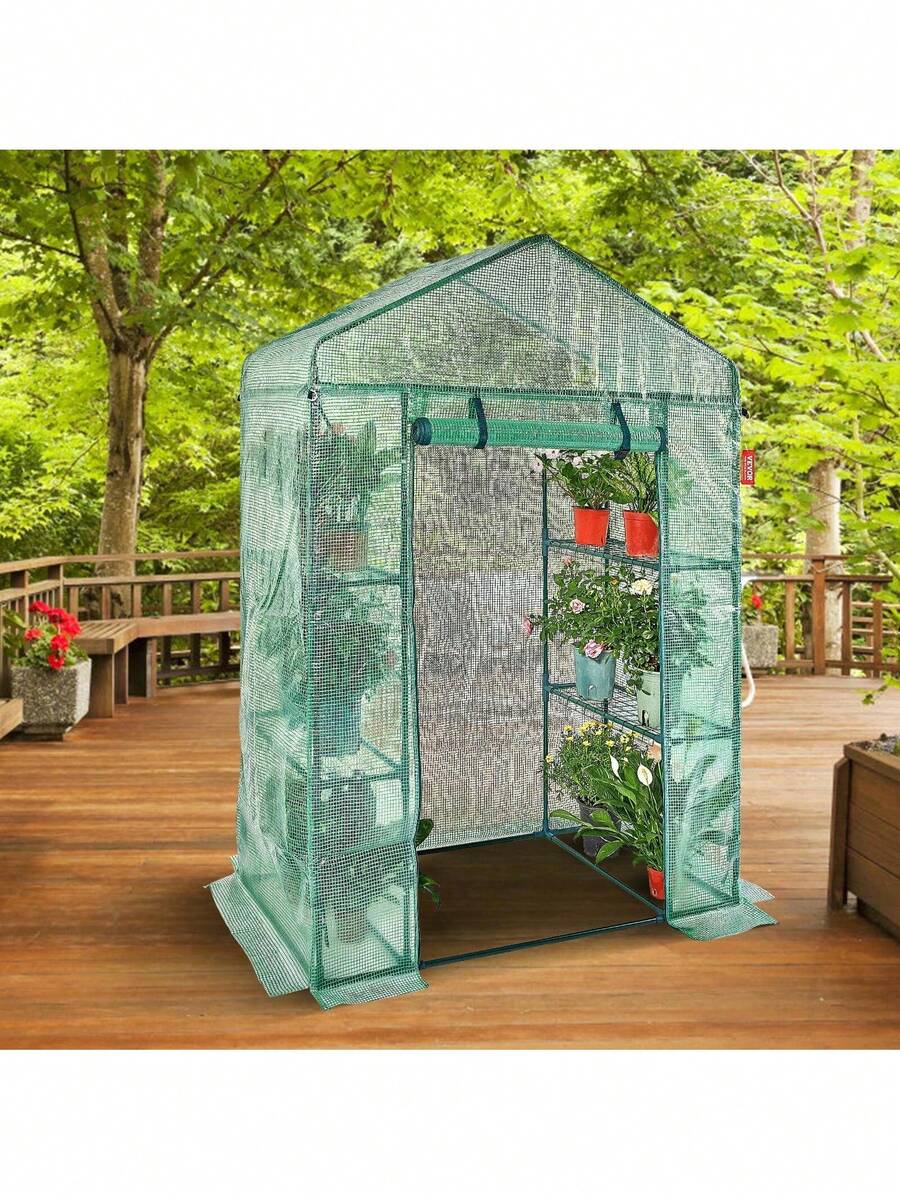 Invernadero portátil de 140 x 74 x 203 cm con estantes, cubierta de polietileno de alta resistencia, puerta enrollable con cremallera y estructura de acero. Se instala en minutos. Ideal para plantar y almacenar. - Verde - Ver 1