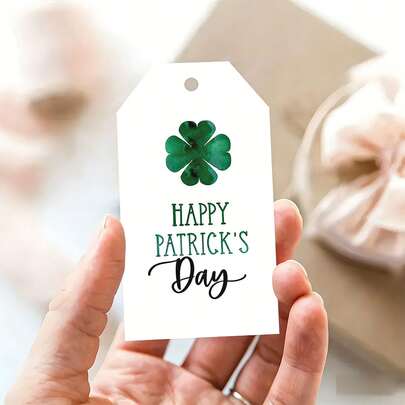 24/48 个礼品标签，印有“圣帕特里克节快乐”字样，采用麻绳编织，饰以四叶草图案，是圣帕特里克节礼物、幸运礼物、装饰品等的完美之选，传递着希望之情。