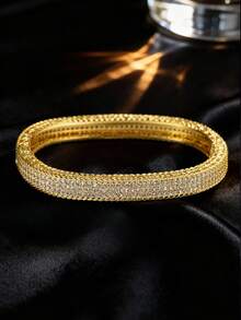 1 chiếc vòng tay mạ vàng 18K, thích hợp cho các dịp trang trọng như dạ hội và đám cưới. Một món quà thanh lịch và sang trọng dành tặng mẹ hoặc người yêu nhân dịp năm mới hoặc kỷ niệm. - Vàng - Xem 6