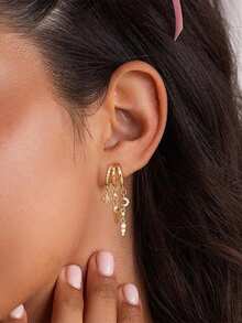 一对时尚奢华不对称流苏立方氧化锆黄铜镀金耳环，适合派对、度假、送礼和日常佩戴