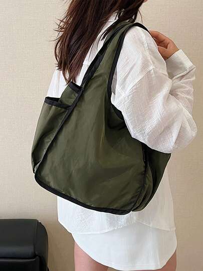 En damväska, en hopfällbar shoppingväska med stor kapacitet och en bekväm öppnings- och stängningsdesign. Den har en enkel design, enfärgad, flera fickor och är multifunktionell, lämplig för olika tillfällen. Den är klassisk, hållbar och bekväm att ta på, lätt att rengöra och lätt att matcha för pendling, resor och shopping.